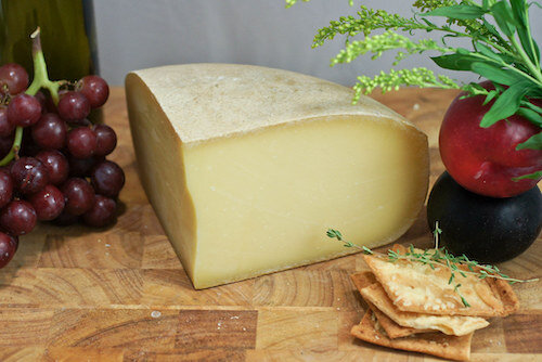 "Pleasant Ridge Reserve Cheese"  by  artizone  is licensed under CC BY-NC-ND 2.0